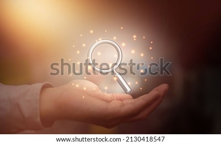 hand hold magnify glass for search technology concept