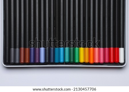 Writing instruments: a lot of color pencils next to each other on isolated white background. Colorful illustration photo for decoratition poster or design picture.