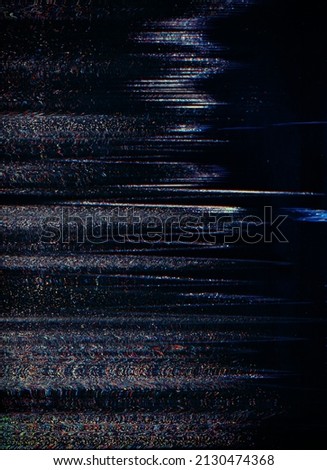 Glitch overlay. Static distortion. Signal interference. Matrix defect. Purple blue color fuzzy pixel noise on dark black distressed abstract background. Royalty-Free Stock Photo #2130474368