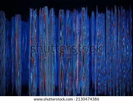 Glitch texture overlay. Pixel noise. Distressed electronic screen. Blue red color static distortion artifacts on dark black grunge background.