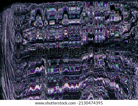 Digital glitch. Pixel noise texture. Electronic defect. Computer virus. Purple green color static distortion artifact pattern on dark black abstract background.