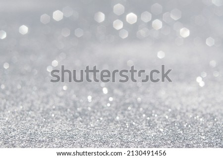 Abstract background with a white light blur .