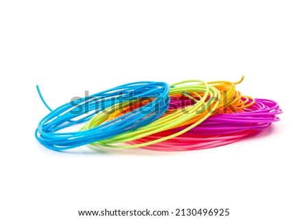 color plastic filament for printing on a 3D printer on white background
