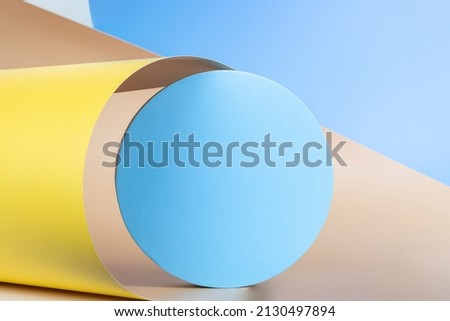 Abstract geometric texture background. Round shape geometric forms and curved lines in pastel yellow, beige, light blue colours