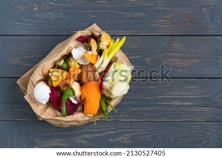 Vegetable and fruit waste from cooking, collected in a garbage bag for recycling. Compost. The concept of zero waste. Royalty-Free Stock Photo #2130527405