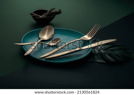 dining cutlery set on non isolated background Royalty-Free Stock Photo #2130561824