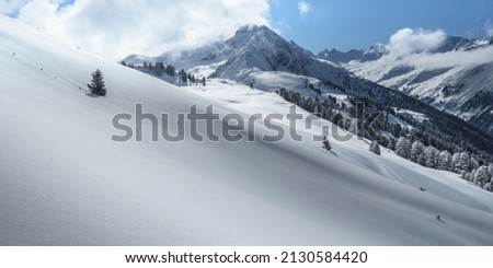 Panoramic picture of a snow-covered winter landscape in Austria