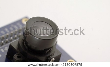 Digital camera lens IP security spy cam electronic component. Small single board computer, device for study at white isolated. Electronics diy. Royalty-Free Stock Photo #2130609875