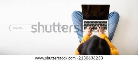 Top view of women use computer laptop to find what they are interested in. Searching information data on internet networking concept Royalty-Free Stock Photo #2130636230