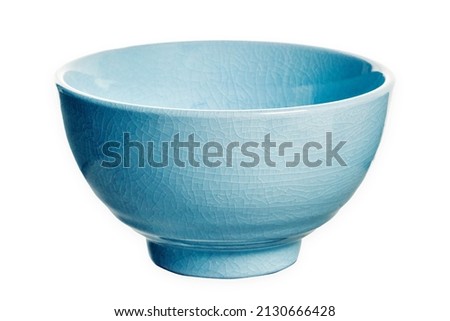 Ceramic bowl with cracked pattern, Blue bowl isolated on white background with clipping path, Side view                              Royalty-Free Stock Photo #2130666428