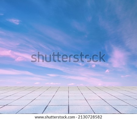 pink clouds, blue sky, gray floor. neon dramatic background.