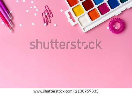 stationery on a pink background, space for creativity, top view, space for text