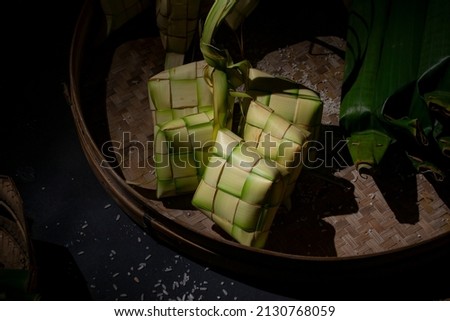 Ketupat is a typical Indonesian food during the Eid season. Ketupat, rice made from wrapped in young coconut leaves.