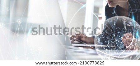 Internet network technology, digital software development, future tech background, IoT concept. Woman using digital tablet and laptop with global network connection, computer code Royalty-Free Stock Photo #2130773825