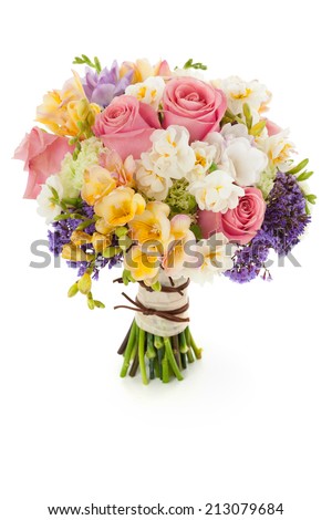 Pastel colors wedding bouquet made of Roses, Freesia, Carnation and Limonium flowers isolated on white. Royalty-Free Stock Photo #213079684