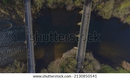 An aerial view of the bridges at Crook O Lune near Lancaster in Lancashire, UK Royalty-Free Stock Photo #2130850541