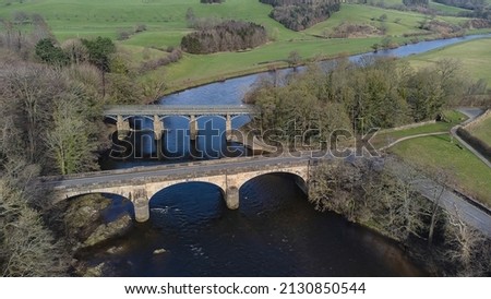 An aerial view of the bridges at Crook O Lune near Lancaster in Lancashire, UK Royalty-Free Stock Photo #2130850544