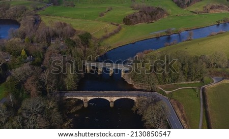 An aerial view of the bridges at Crook O Lune near Lancaster in Lancashire, UK Royalty-Free Stock Photo #2130850547