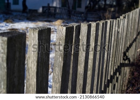 wood fence in the winter 