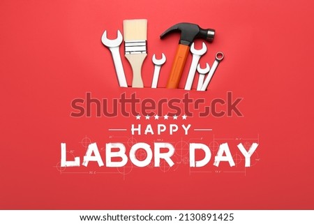 Greeting card for Labor Day or International Workers' Day with set of tools Royalty-Free Stock Photo #2130891425