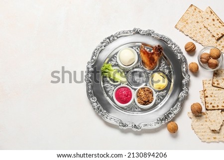 Composition with Passover Seder plate  on white background Royalty-Free Stock Photo #2130894206