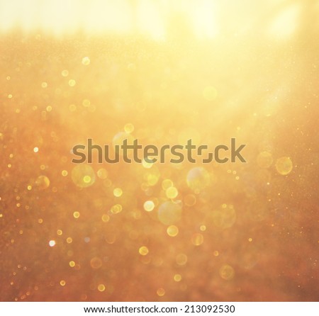 abstract background of golden bokeh lights. 