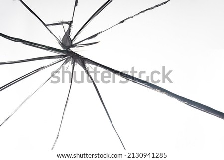 Broken glass close-up. Problem metaphor. White background with crack. Background on theme of breakage. Pattern with shattered mirror. Shattered background. Broken glass texture
