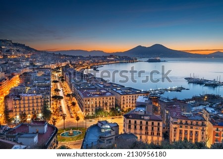 Naples, Italy aerial skyline on the bay with Mt. Vesuvius at dawn. Royalty-Free Stock Photo #2130956180