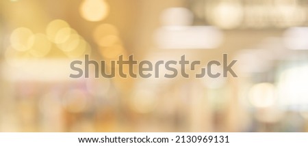 abstract blur interior luxury hotel with bokeh light background for design 