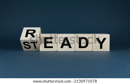 Ready and steady. The cubes form a ready and steady expression. Business or sport concept Royalty-Free Stock Photo #2130971078