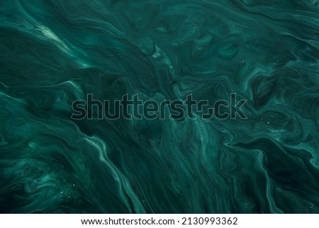 Fluid Art. Liquid Velvet Jade green abstract drips and wave. Marble effect background or texture Royalty-Free Stock Photo #2130993362