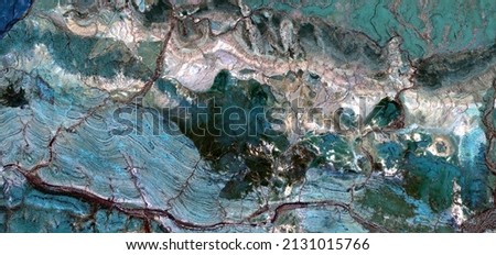 abstract landscape of the deserts of Africa from the air emulating the shapes and colors of the dystopian landscapes