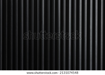 Minimalist art picture: black pencils next to each other form vertical dark lines. Artistic, elegant design structure for graphics, backgrounds. Royalty-Free Stock Photo #2131074548