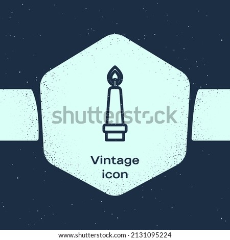 Grunge line Burning candle in candlestick icon isolated on blue background. Old fashioned lit candle. Cylindrical candle stick with burning flame. Monochrome vintage drawing. Vector