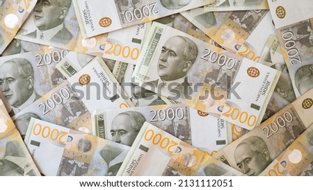 Serbian dinar paper currency, 2000 dinars value. Serbian 2000 dinar currency banknote. Serbia money RSD dinar cash. Background of two thousand dinars Serbia money. Royalty-Free Stock Photo #2131112051