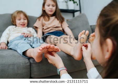 LITTLE GIRLS FEET AND HANDS Stock Photos and Images - Avopix.com