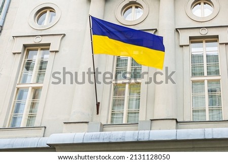 Ukraine national flag waving in wind. Blue and yellow color.