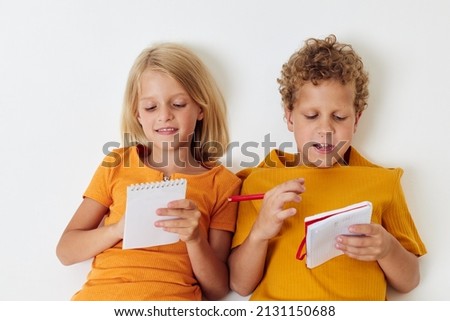 picture of positive boy and girl childhood entertainment drawing childhood lifestyle unaltered