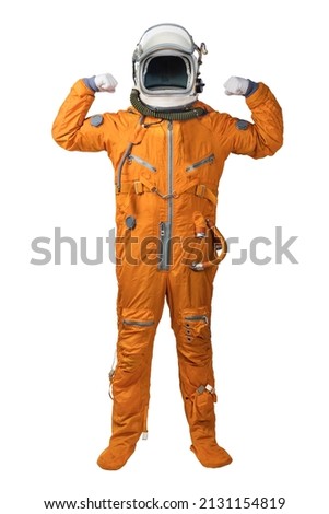 Astronaut wearing orange spacesuit and helmet showing biceps gesture isolated on white background. Unrecognizable cosmonaut with raised hands showing biceps isolated on white background Royalty-Free Stock Photo #2131154819