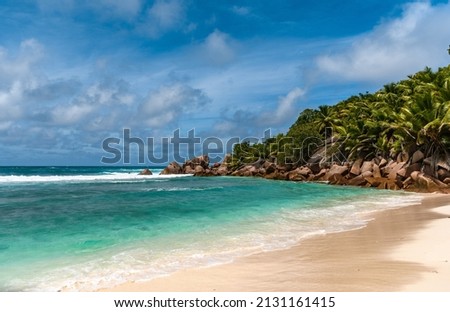 Empty paradise beach on tropical island  Famous tourist and travel destination on La Digue on Seychelles islands 