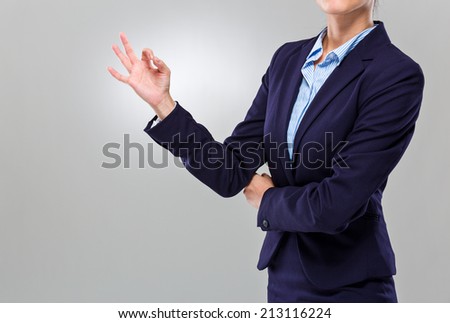 Businesswoman hand with ok sign