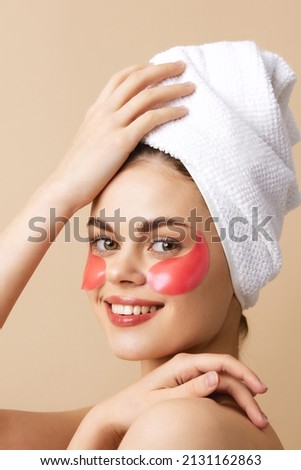 young woman skin care face patches bare shoulders isolated background