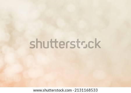 Abstract blurry cream color for background, Blur festival lights outdoor celebration and white bokeh focus texture decorative design elegant for winner.