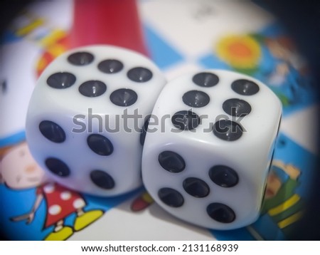 macro photo of two dice with number six