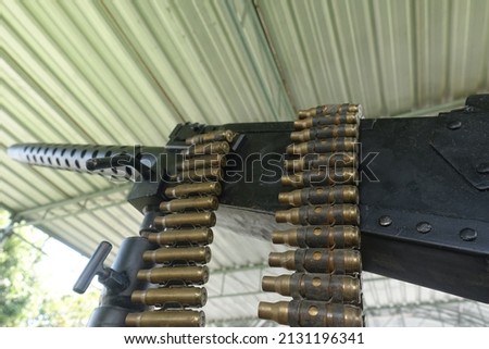 Firearms and empty ammunition . Royalty-Free Stock Photo #2131196341