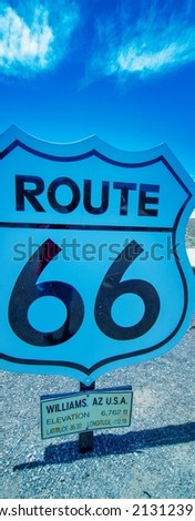 U.S. Route 66 signage (US 66 or Route 66), also known as the Will Rogers Highway and colloquially known as the Main Street of America or the Mother Road, Arizona Royalty-Free Stock Photo #2131239543