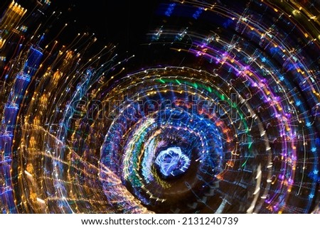 Rotation of bright abstract multicolour lights and shapes