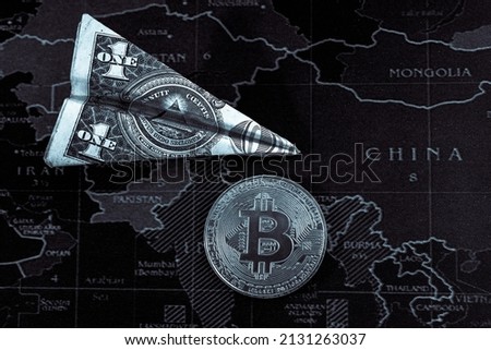A plane made of dollar and bitcoin. Economy and dollar exchange rate. High quality photo