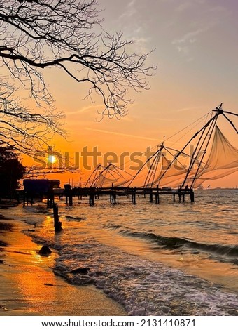 Chinese Fishing Net Cheenavala Fort Kochi Kerala India Tourist attraction Sunset view  Royalty-Free Stock Photo #2131410871