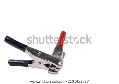 Closeup view of clips for charging battery isolated on white background. Sweden.
